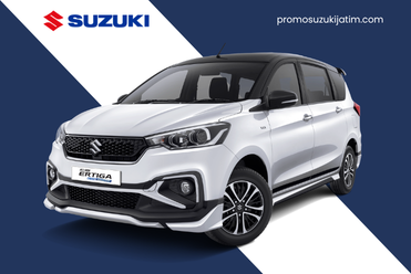 Suzuki Ertiga putih tampak depan dengan desain MPV modern nyaman untuk keluarga